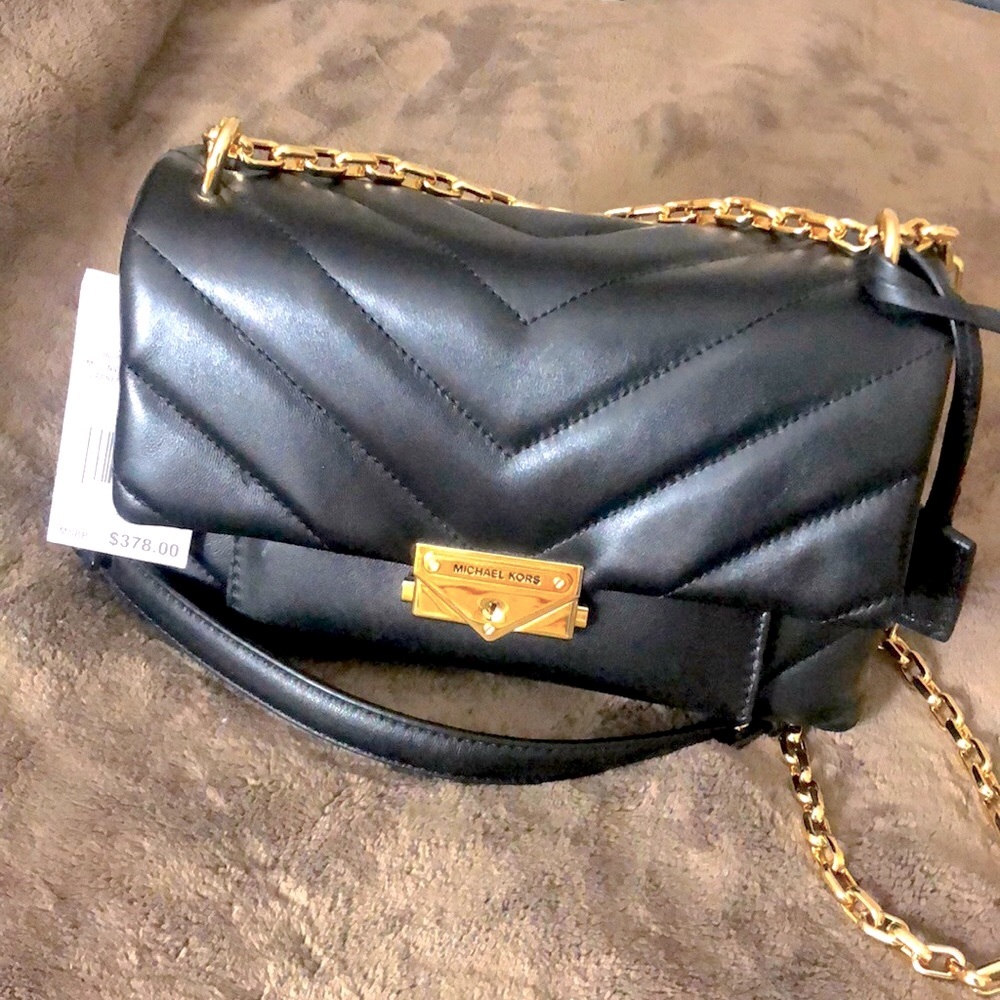 Beautiful genuine leather Michael Kors bag. Brand New with a tag. Never Worn!